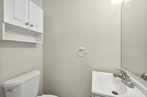 Bathroom with white cabinets, modern fixtures at Lincoln Court Townhomes, 230 Lincoln Street, Fairview, Oregon 97024