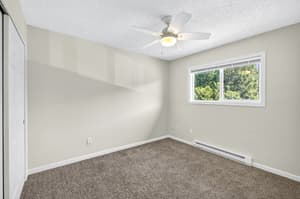 Bedroom with carpet flooring, ceiling fan at Lincoln Court Townhomes, 230 Lincoln Street, Fairview, Oregon 97024