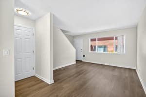Living Room with hardwood floors, large window at Lincoln Court Townhomes, 230 Lincoln Street, Fairview, Oregon 97024