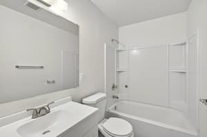 Bathroom with white vanity, bathtub shower combo at Lincoln Court Townhomes, 230 Lincoln Street, Fairview, Oregon 97024