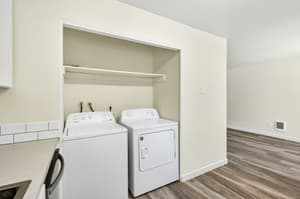 Laundry with washer dryer, shelving at Lincoln Court Townhomes, 230 Lincoln Street, Fairview, Oregon 97024