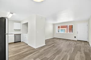 Living Room with hardwood floors, large windows at Lincoln Court Townhomes, 230 Lincoln Street, Fairview, Oregon 97024