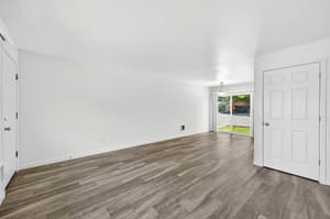 Living Room with wood flooring, large window at Lincoln Court Townhomes, 230 Lincoln Street, Fairview, Oregon 97024