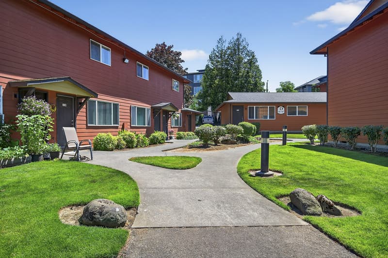 Exterior with landscaped garden, paved pathway at Lincoln Court Townhomes, 230 Lincoln Street, Fairview, Oregon 97024