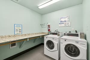 On-site laundry facilities with multiple washers and dryers