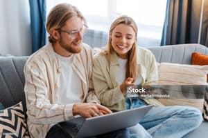 Person browsing available townhomes on a laptop